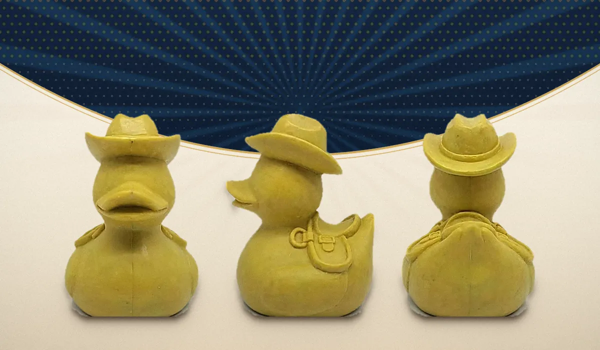 A hand-sculpted clay original shown from the front, side and back, the stage where shape revisions happen before any tooling is cut